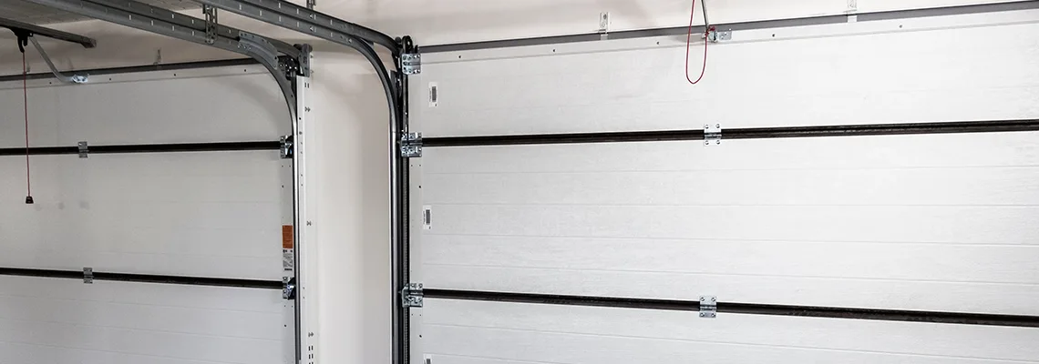Fix Folding Garage Door Jerking in Innisfil, Ontario