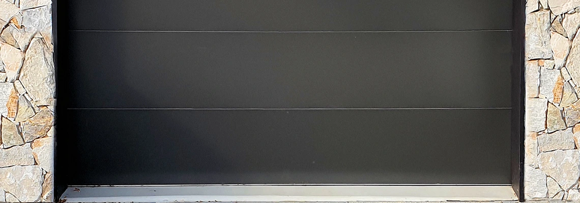Overhead Black Garage Door Installation in Innisfil, Ontario
