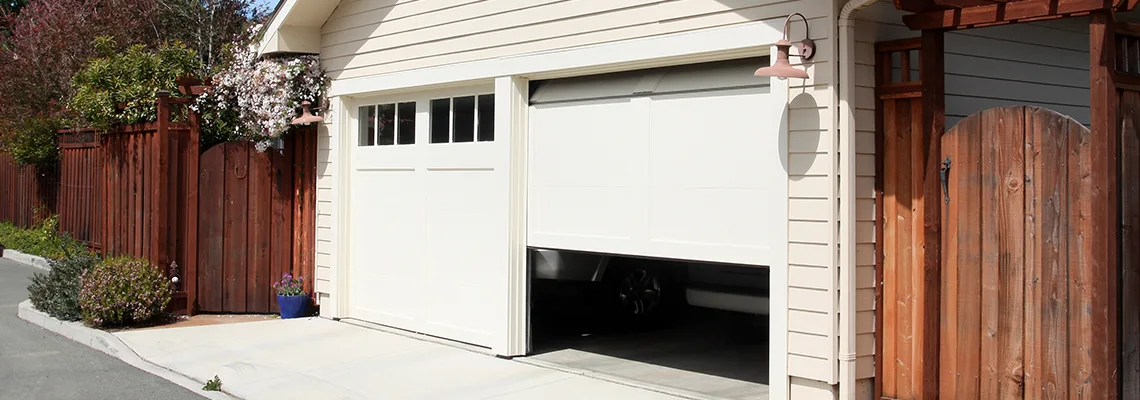 Fix Metal Garage Door Jerking in Innisfil, Ontario